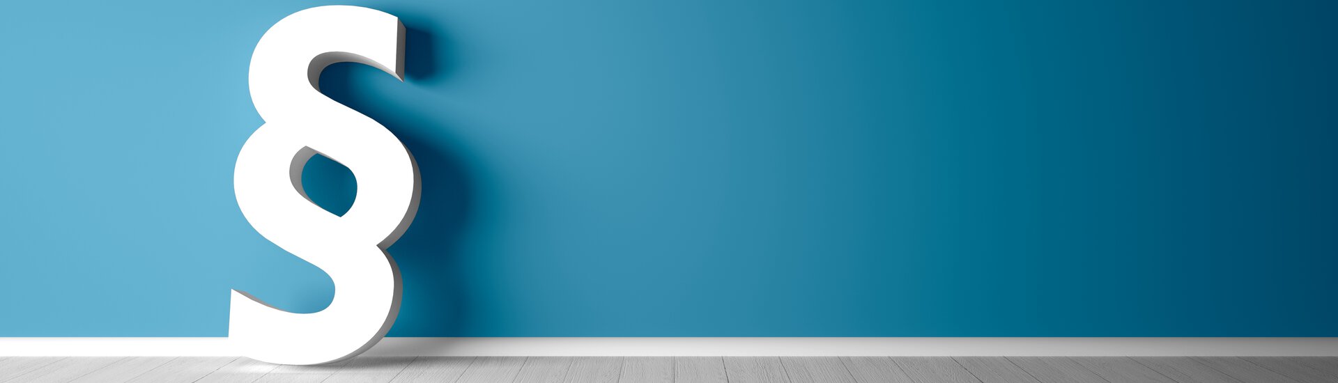 Weißes dreidimensionales Paragraphenzeichen vor blauem Hintergrund