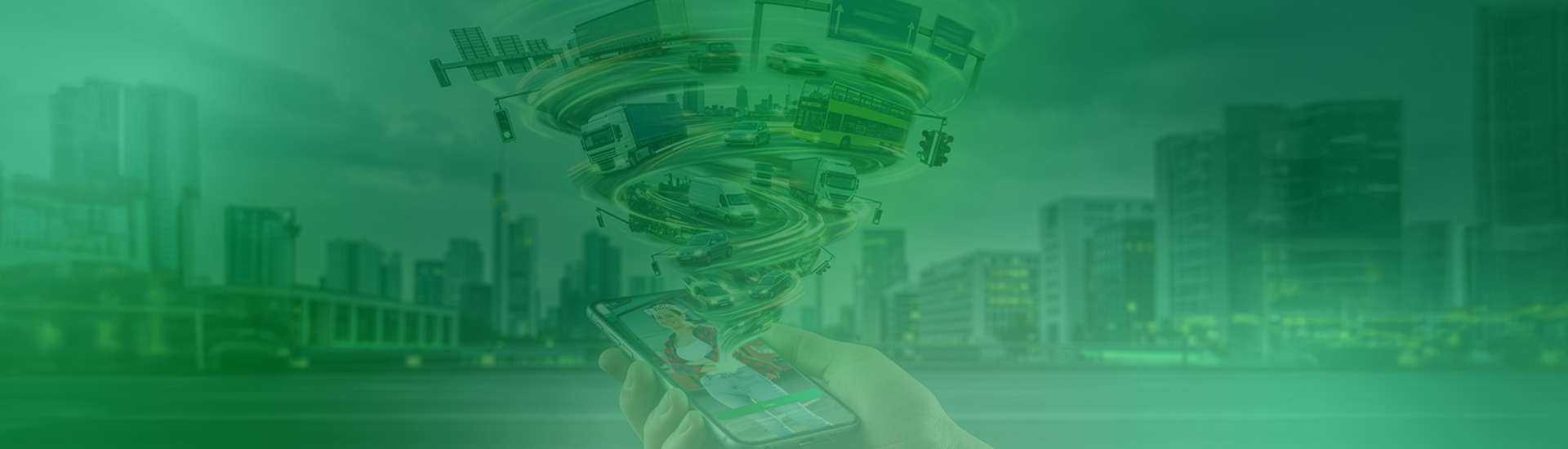 eine Männerhand hät ein Smartphone aus dem ein Wirbel mit Autos, Bussen, Lkws und Straßenschildern kommt